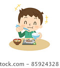 Boy grilled fish eating with a smile 85924328