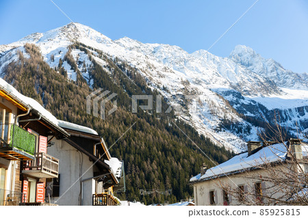 Small village and ski resort of Argentiere in French Alps on sunny winter day 85925815