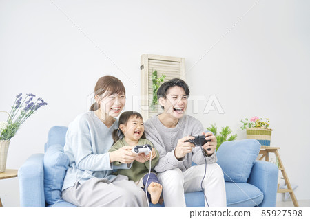 Family playing video games Family playing video games 85927598