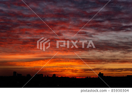 The wonderful glow of the sun that illuminates the sky and clouds 85930304