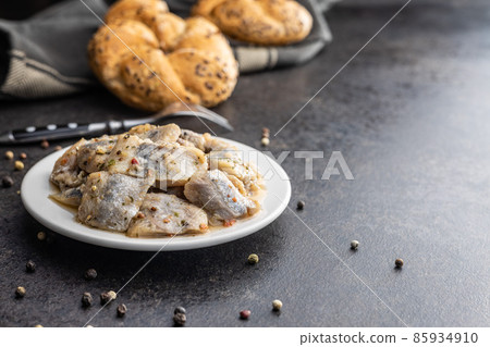 Chopped marinated fish. Salted herring 85934910