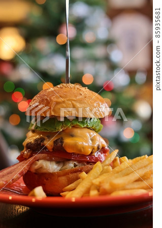 Gourmand burger, potatoes and Christmas tree vertical Gourmand burger, potatoes and Christmas tree vertical 85935681