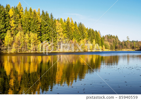 Autumn landscape reflecting on the surface of the pond. Czech republic Autumn landscape reflecting on the surface of the pond. Czech republic 85940559