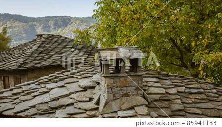 Old traditional Bulgarian house in mountain village of Kovachevitsa. Traditional slan stone roofs 85941133