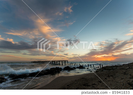 Beautiful dramatic sunset over the old bridge by the sea in Balchik, Bulgaria, Eastern Europe - dawn, dusk 85941833