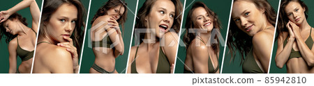 Set of portraits of young beautiful tanned smiling woman in green underwear isolated over dark green studio background. Natural beauty 85942810