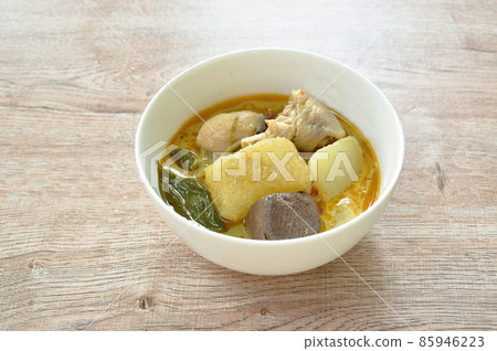 spicy boiled slice winter melon with chicken and blood in coconut milk green curry soup on bowl 85946223