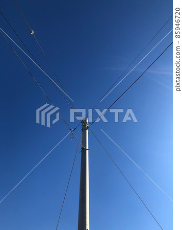 Blue sky and telephone pole 85946720