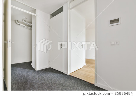 Minimalistic pretty empty room with gray carpet 85956494