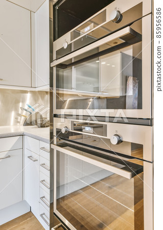 Delightful modern stove in a chic kitchen 85956586