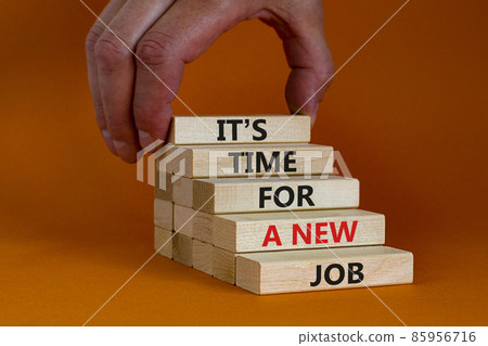 It is time for a new job symbol. Wooden blocks with words It is time for a new job. Beautiful orange background, copy space. Businessman hand. Business, time for a new job concept. It is time for a new job symbol. Wooden blocks with words It is time for a new job. Beautiful orange background, copy space. Businessman hand. Business, time for a new job concept. 85956716