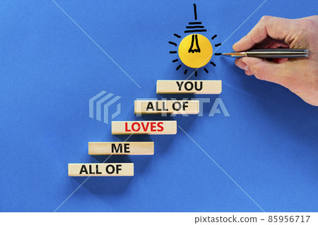 All of me loves all of you symbol. Wooden blocks with words All of me loves all of you on blue background, copy space. Light bulb icon. Man hand with pen. Lifestyle, love concept. All of me loves all of you symbol. Wooden blocks with words All of me loves all of you on blue background, copy space. Light bulb icon. Man hand with pen. Lifestyle, love concept. 85956717