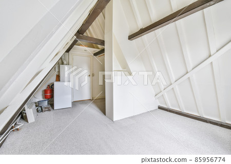 Attic area of a house with trimmer joists 85956774