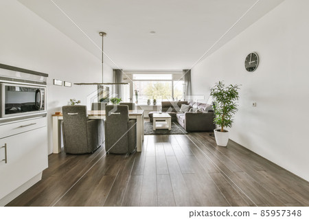 Large modern studio room with living room, dining area and kitchen Large modern studio room with living room, dining area and kitchen 85957348