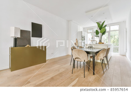 Stylish dining room with trendy table and chairs 85957654