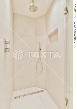 Luxurious bathroom with built-in shower head in the shower Luxurious bathroom with built-in shower head in the shower 85958477