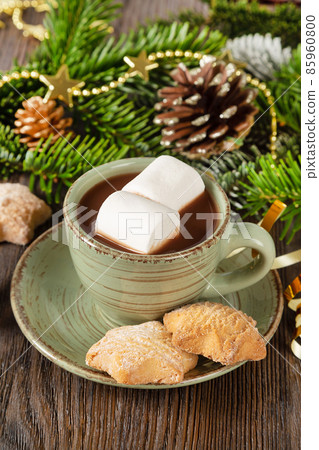 Hot chocolate and sweet homemade cookies Hot chocolate and sweet homemade cookies 85960800
