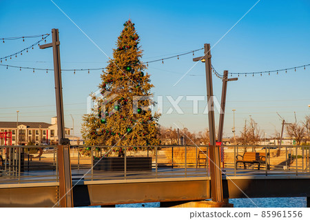 Afternoon view of a christmas tree, building in the Chisholm Creek area Afternoon view of a christmas tree, building in the Chisholm Creek area 85961556