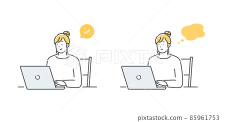 A woman using a computer A woman using a computer 85961753