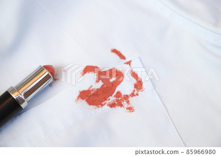 dirty lipstick stain on cloth from daily life activity for cleaning concept. housework care living life of people dirty lipstick stain on cloth from daily life activity for cleaning concept. housework care living life of people 85966980