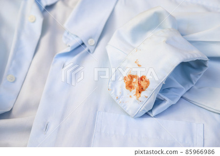 dirty barbeque sauce stain on cloth from daily life activity for cleaning concept. housework care living life of people dirty barbeque sauce stain on cloth from daily life activity for cleaning concept. housework care living life of people 85966986