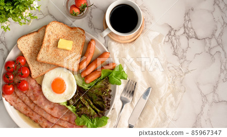 Yummy healthy breakfast set with a cup of coffee on marble table. 85967347