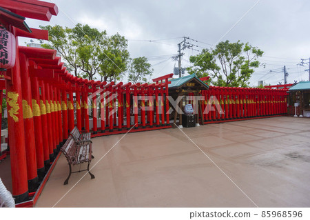 Red Tori gate at Sairaiin (Daruma Temple) in Naha, Okinawa, Japan 85968596