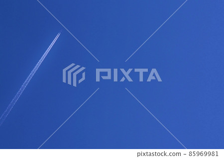 Cloudless sky and pure white contrails with copy space 85969981
