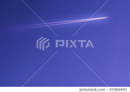 Cloudless sky and pure white contrails with copy space 85969983