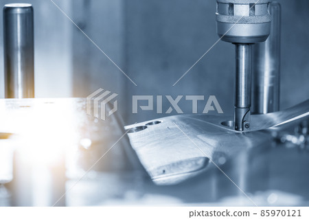The CNC milling machine rough cutting the injection mold parts by indexable  endmill tools. 85970121
