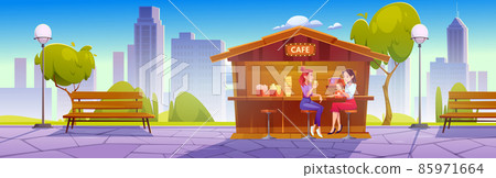 Girls drink coffee sitting in street cafe in park Girls drink coffee sitting in street cafe in park 85971664