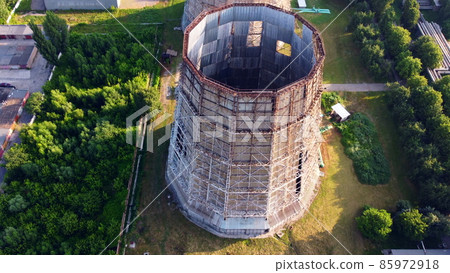 Aerial drone view flight near thermal power plant. Cooling towers of CHP 85972918
