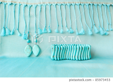 Turquoise bracelet and earrings from natural stone on fringed scarf Turquoise bracelet and earrings from natural stone on fringed scarf 85973453