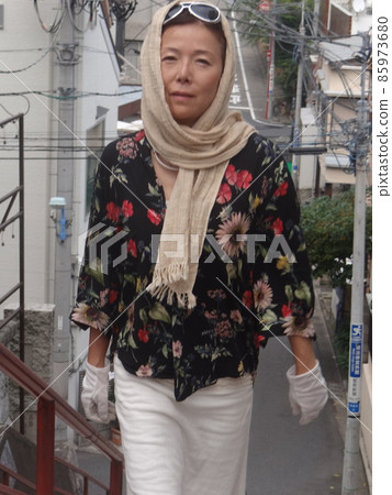 Healthy tall woman taking a walk 85973680