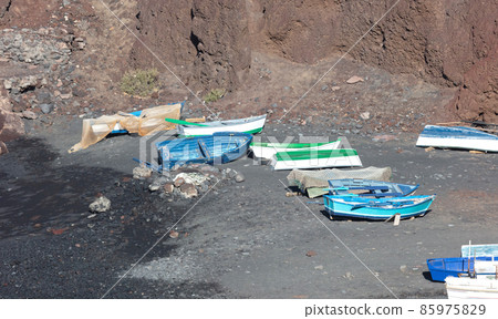 Green Lagoon at El Golfo with fishing boats on the beach, Lanzarote Green Lagoon at El Golfo with fishing boats on the beach, Lanzarote 85975829