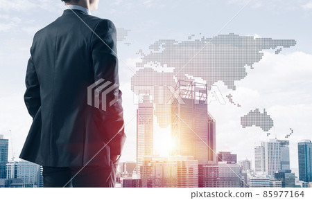 Concept of business success and control with confident boss against cityscape background Concept of business success and control with confident boss against cityscape background 85977164