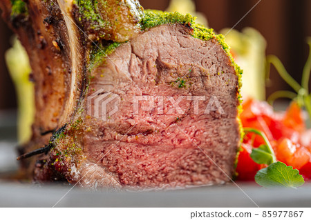 Closeup on rack of lamb with mashed potatoes Closeup on rack of lamb with mashed potatoes 85977867