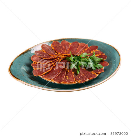 Isolated plate of dried beef tenderloin basturma Isolated plate of dried beef tenderloin basturma 85978000