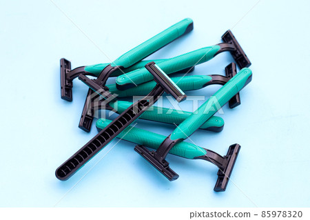 Men razors on blue background. 85978320