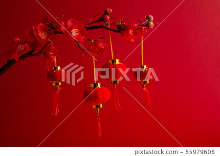 Chinese New Year background with sakura branch and lanterns 85979608
