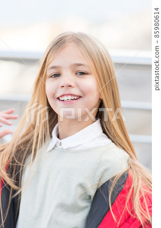 Girl with blond long hair smile outdoor Girl with blond long hair smile outdoor 85980614