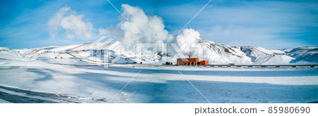 Geothermic energy plant over the snow, panorama 85980690