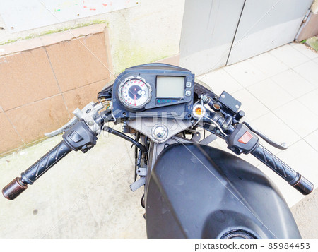 Black motorcycle steering wheel with round speedometer and screen Black motorcycle steering wheel with round speedometer and screen 85984453