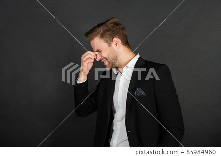 Tired manager suffering from eye strain headache dark background, fatigue Tired manager suffering from eye strain headache dark background, fatigue 85984960