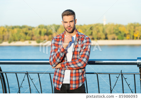 young unshaven guy outdoor. male fashion model. mens beauty. young unshaven guy outdoor. male fashion model. mens beauty. 85986093