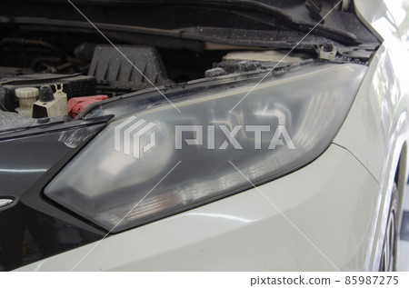 Car headlights before polishing. car details Car headlights before polishing. car details 85987275