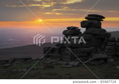 Sunset over Great Staple Tor and the valley below, Dartmoor National Park, Devon 85987728