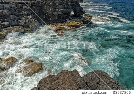 pico island waves on lava cliffs landscape 85987806