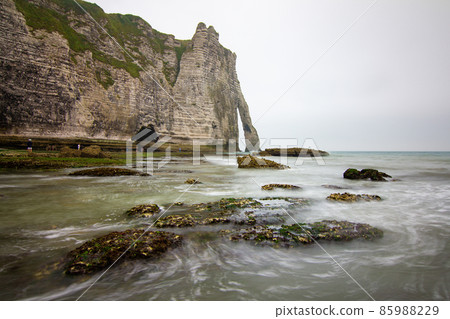 Etretat, France, Normandy. View of the white cliffs from the beach 85988229