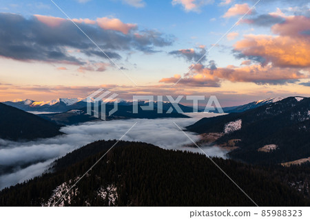 Morning haze in the mountains, picturesque landscapes at sunrise in the mountains and forests. Morning haze in the mountains, picturesque landscapes at sunrise in the mountains and forests. 85988323
